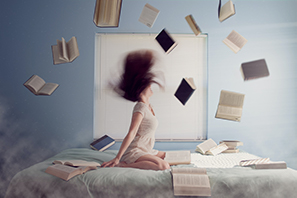 Woman throwing books to represent ADHD therapy